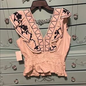 Cream Sleeveless Ruffled Blouse with Embroidered Bib Collar